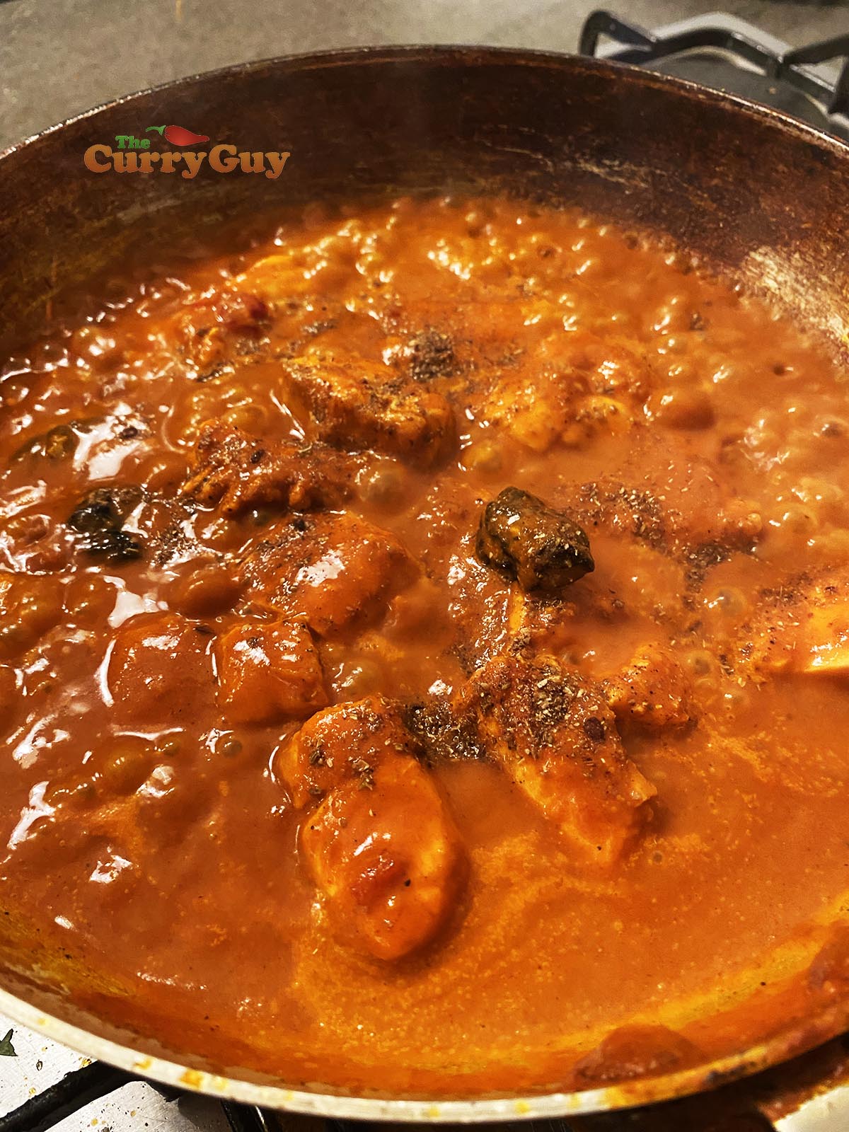Adding fish, kokum and tamarind to pan