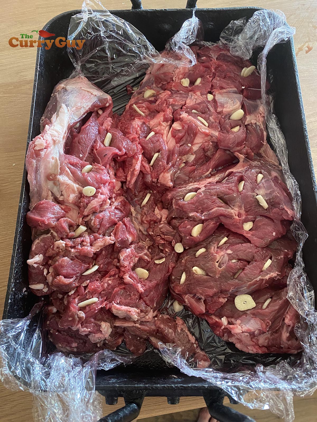 Preparing butterflied lamb raan