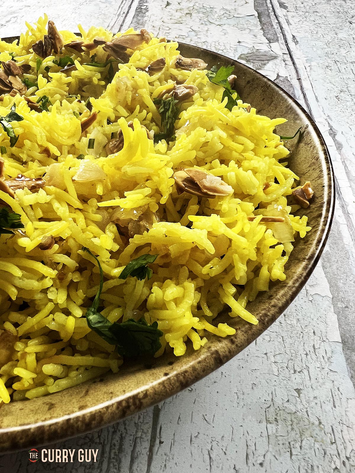 Almond rice served in a bowl.