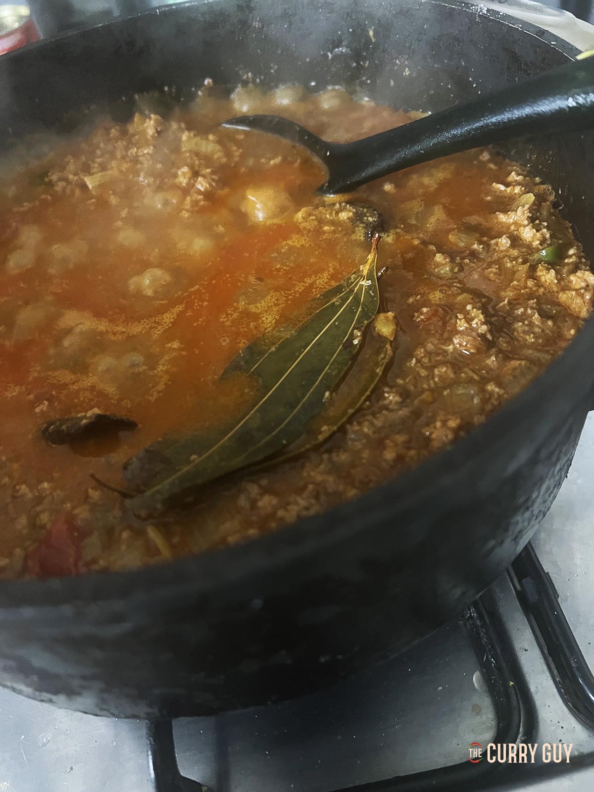 Simmering the sauce.