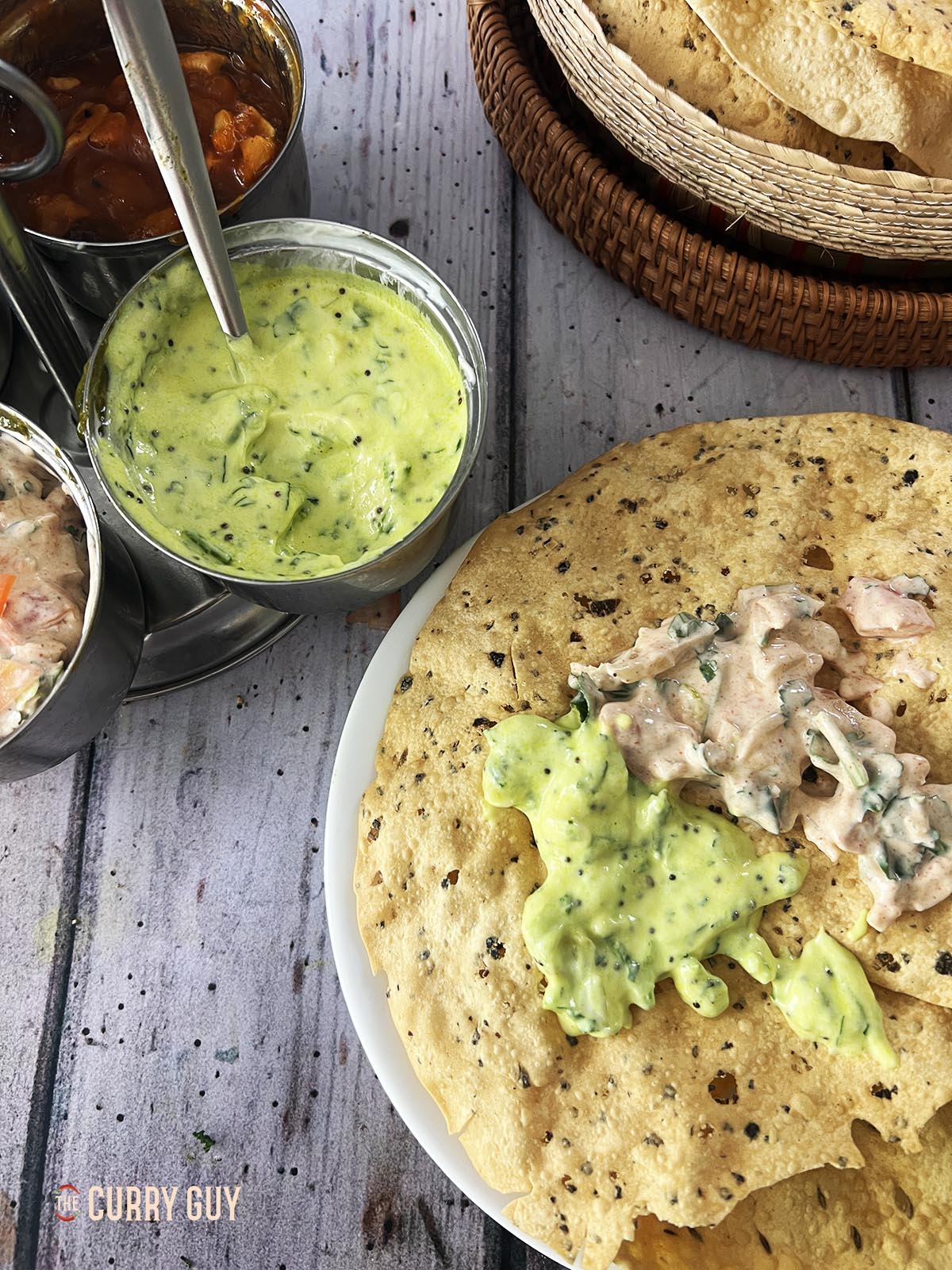 Honey mustard raita on a poppadom.