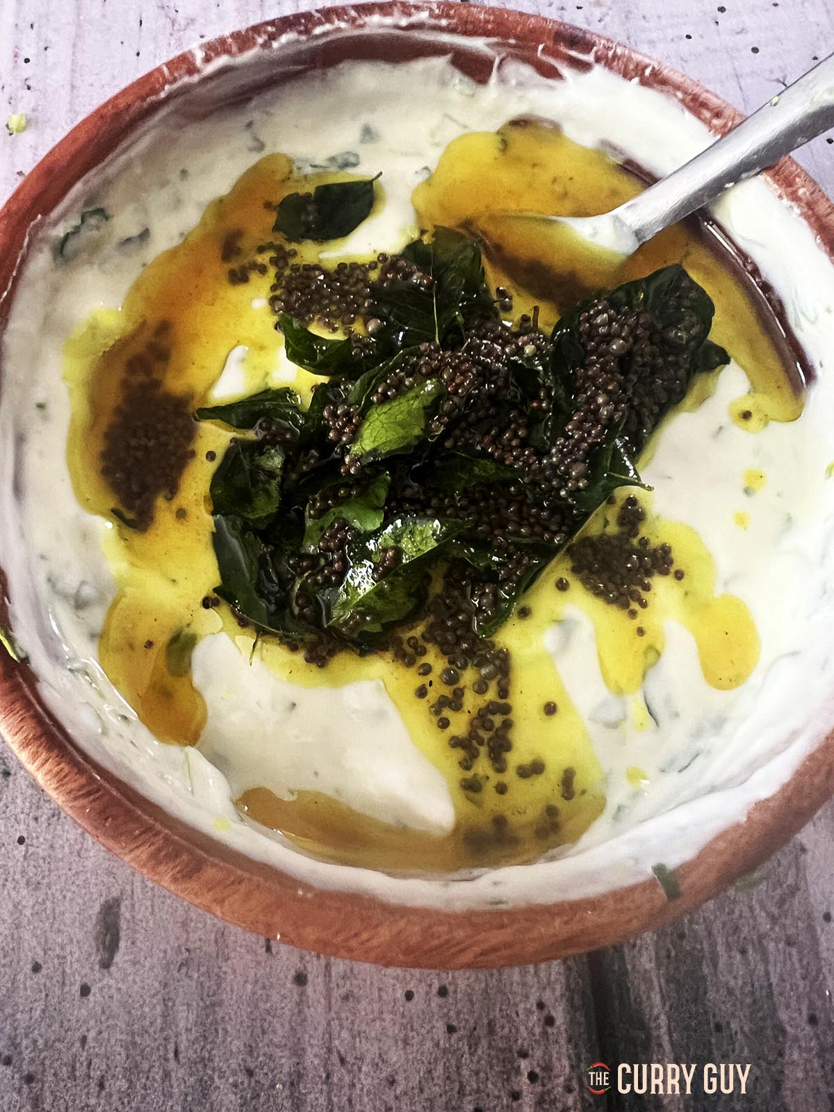 the infused oil on top of the yoghurt.