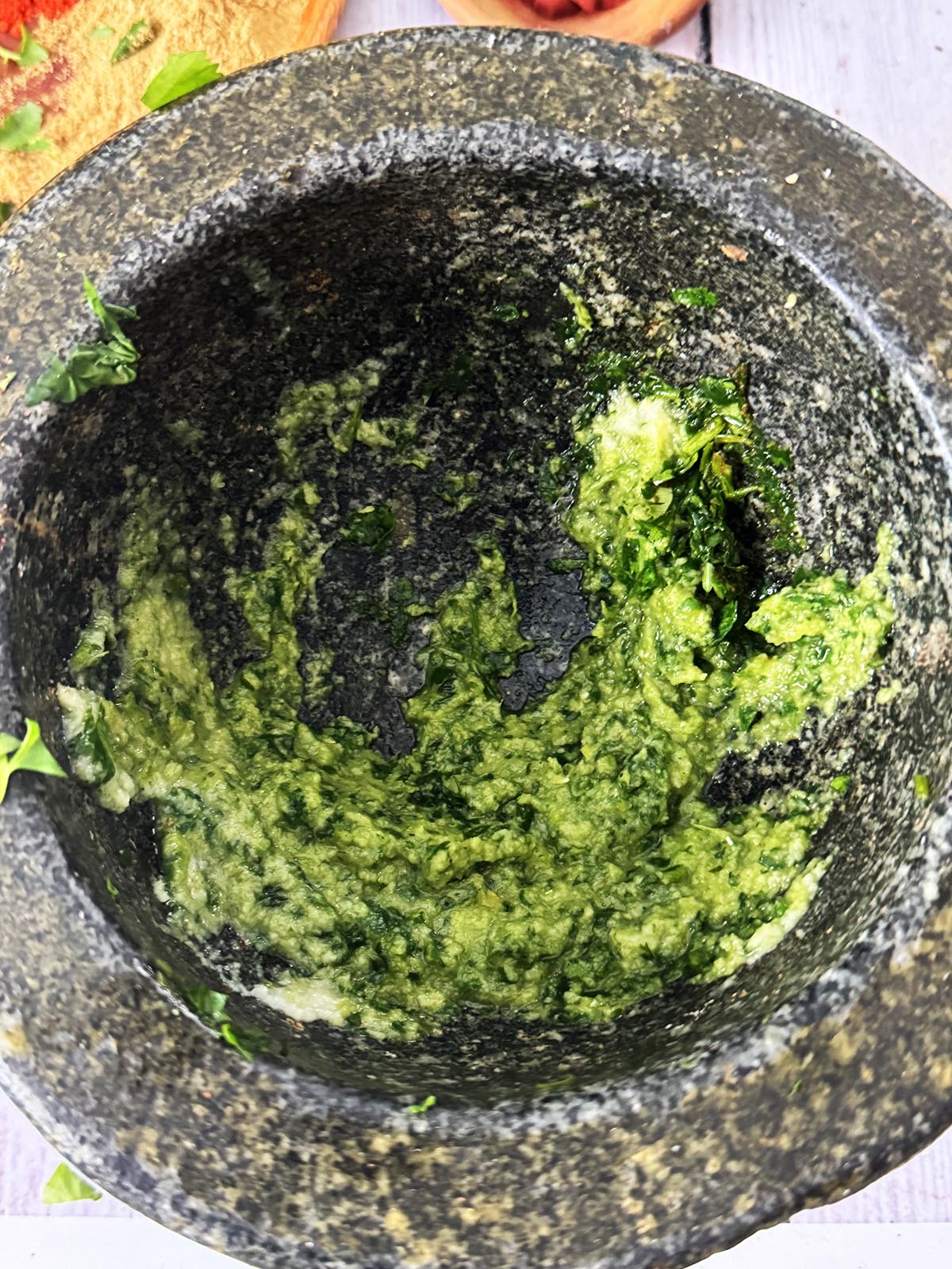 The coriander and chilli paste mixed with garlic and ginger paste.