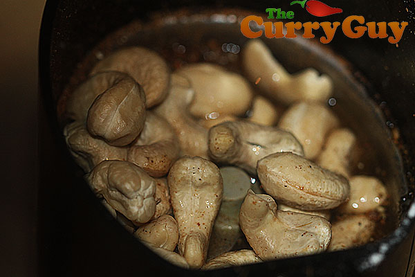 Making Punjabi halibut curry