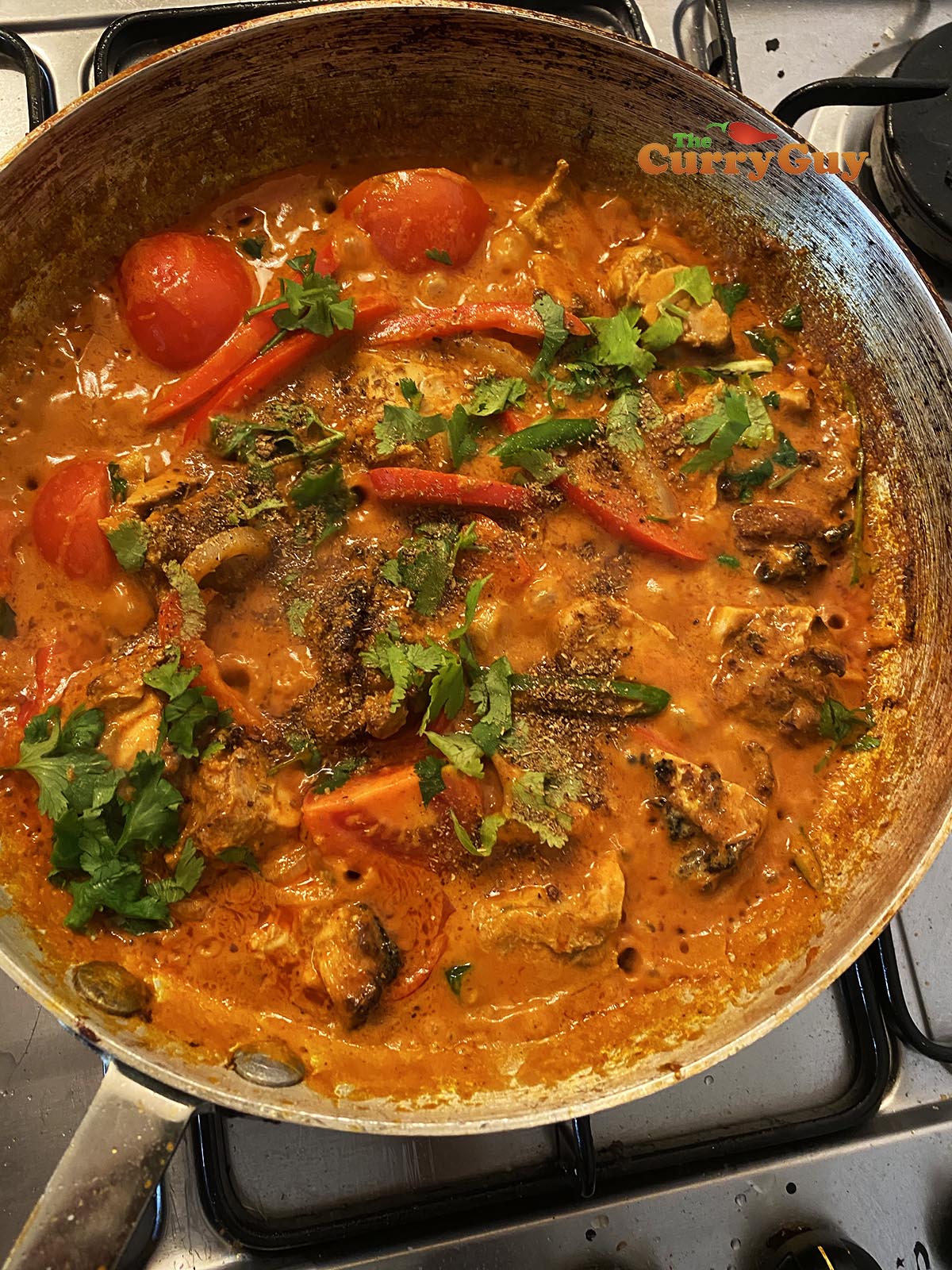 Garnishing with coriander (cilantro)