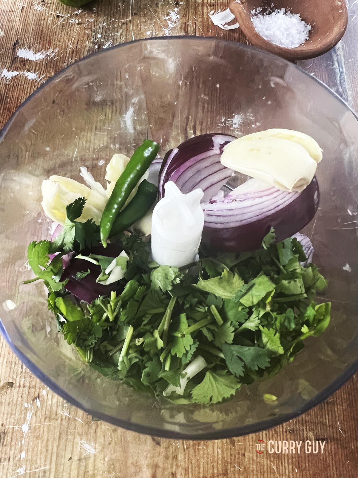 The onion, garlic, chillies and coriander in a food processor.