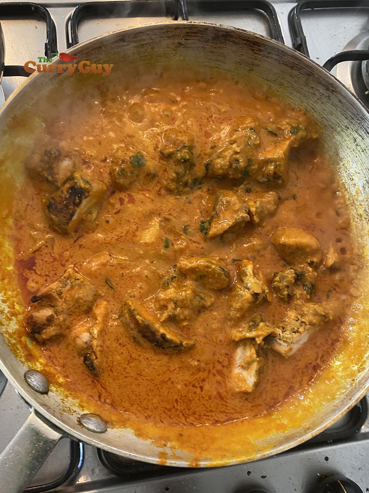 Adding pre-cooked chicken to the pan