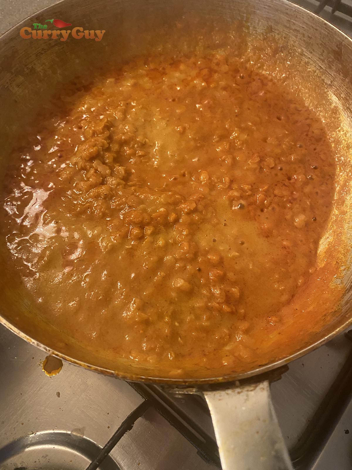 Adding base sauce and lentils