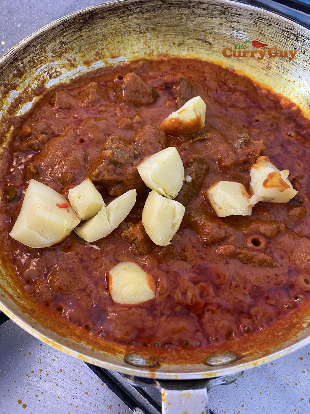 adding pre-cooked potatoes