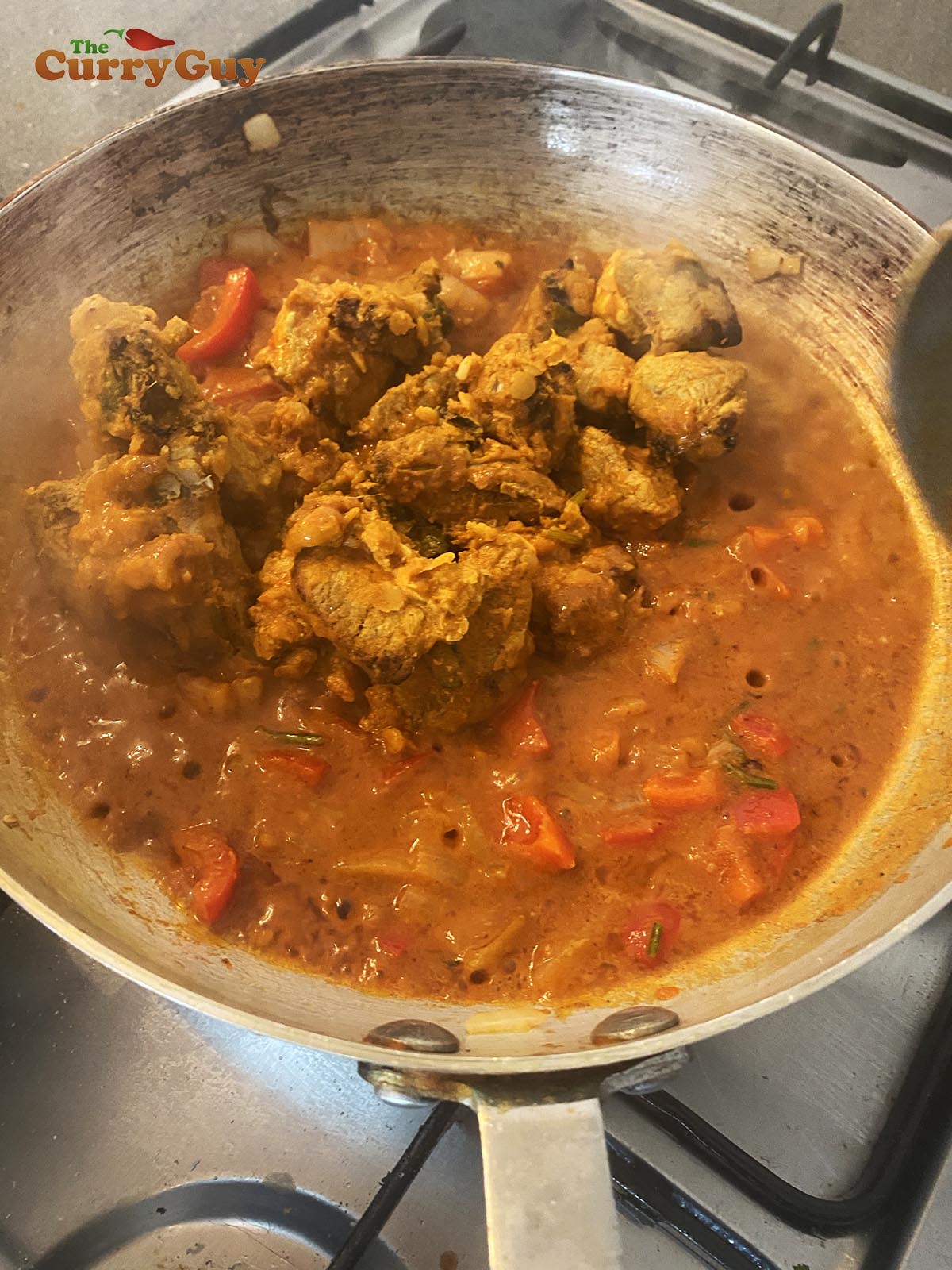 adding meat to the pan