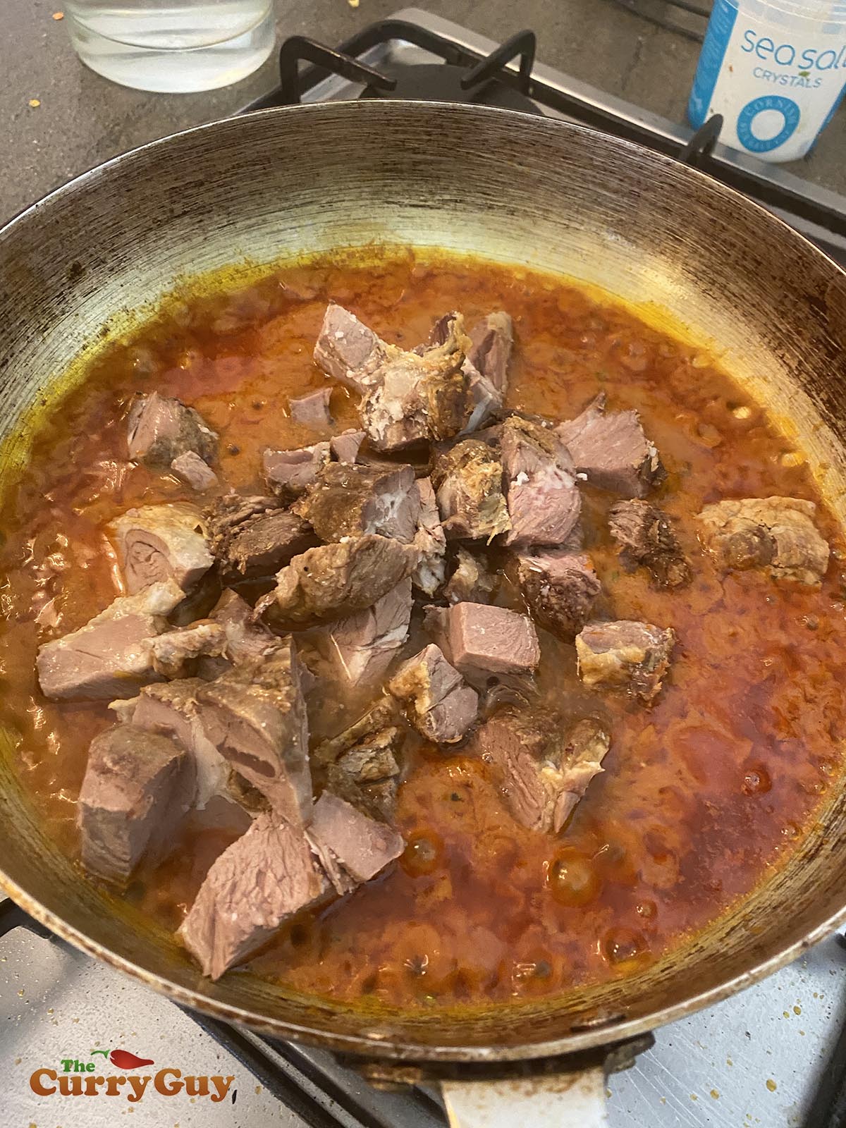 Adding meat to the pan