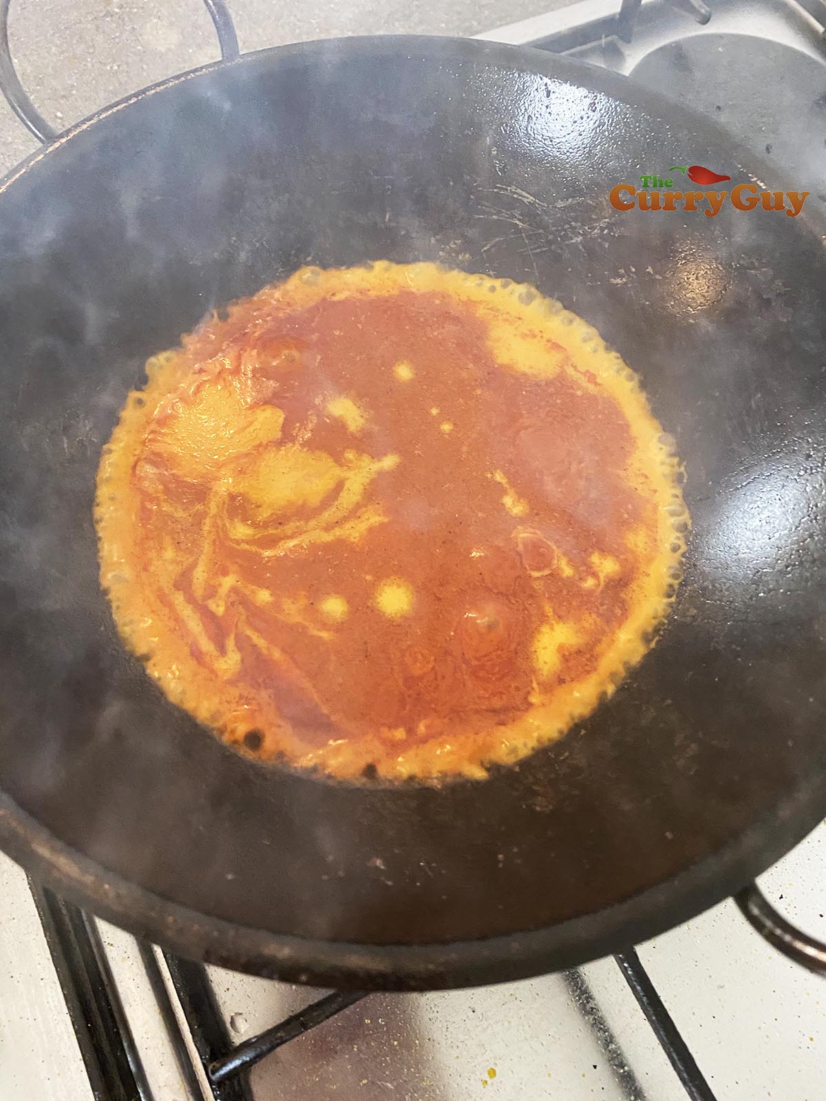 Adding base sauce to pan