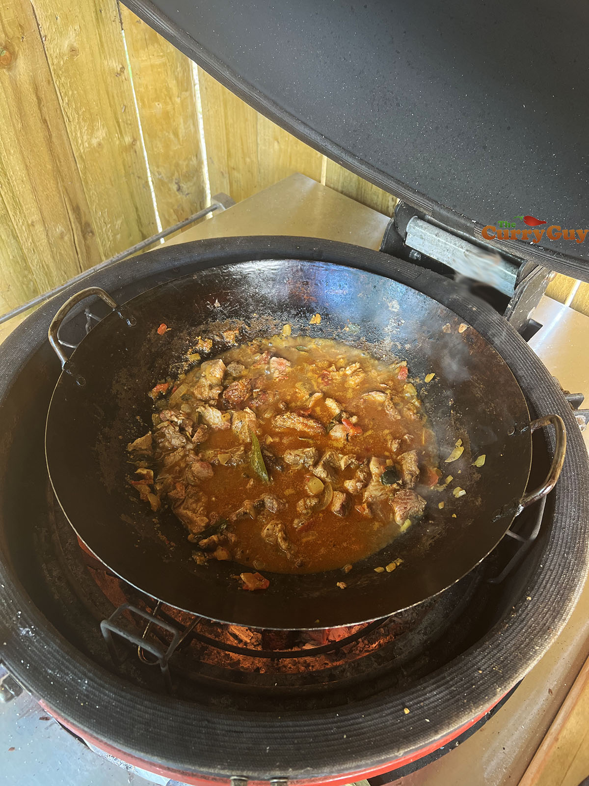 Finishing the vindaloo on the barbecue