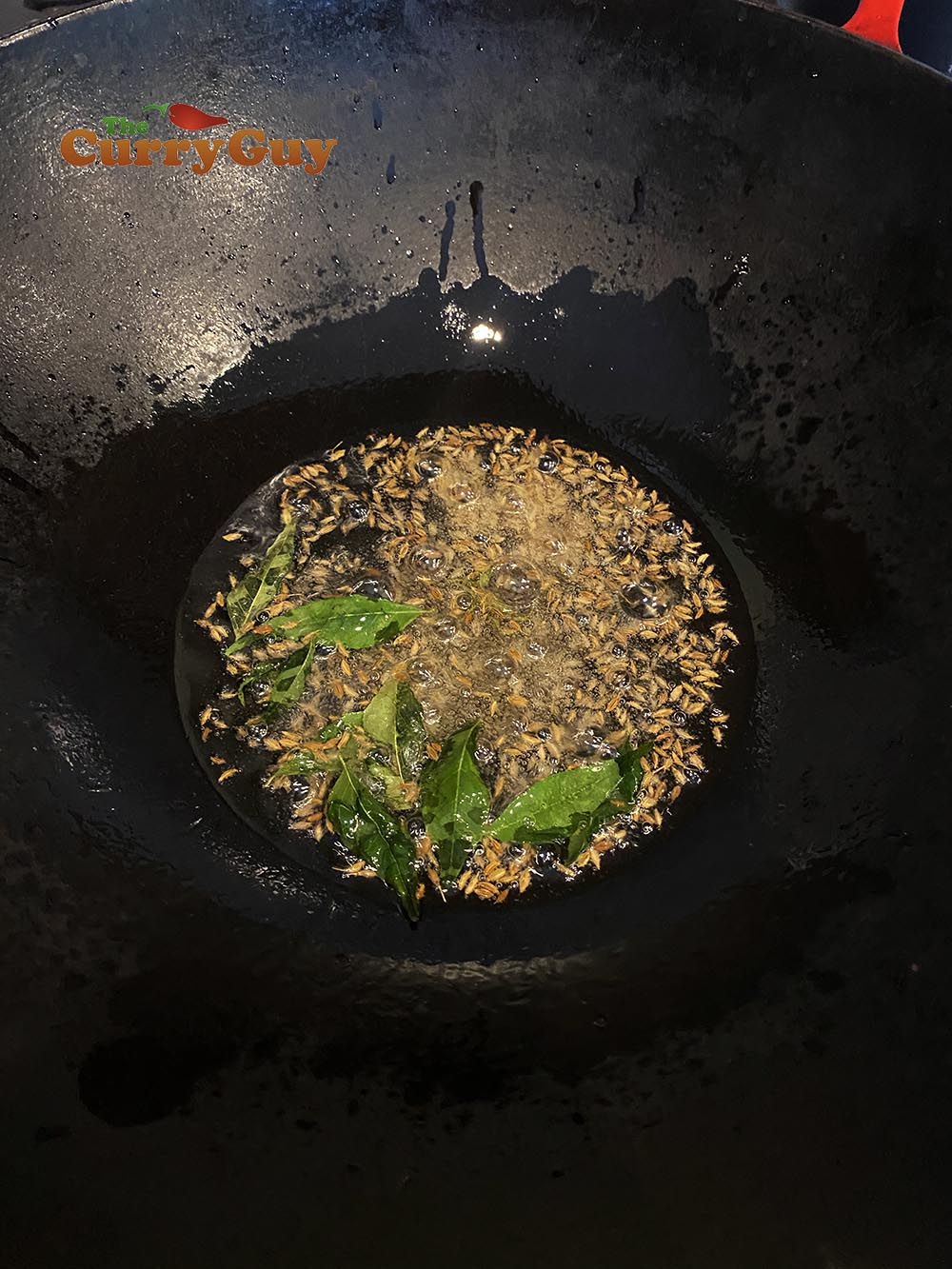 infusing the spices into the oil