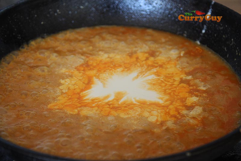 Adding cream to sauce