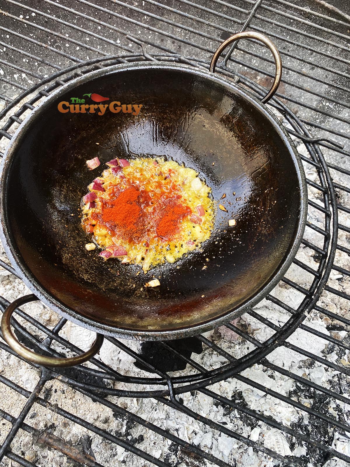 Adding ground spices. 