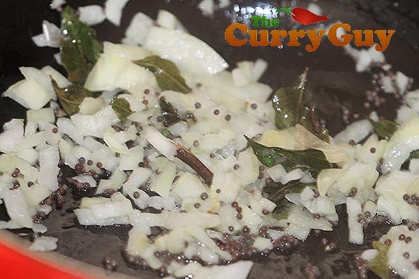 Frying onions for lobster sauce