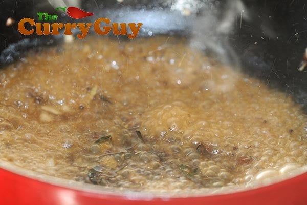 Adding stock for lobster sauce