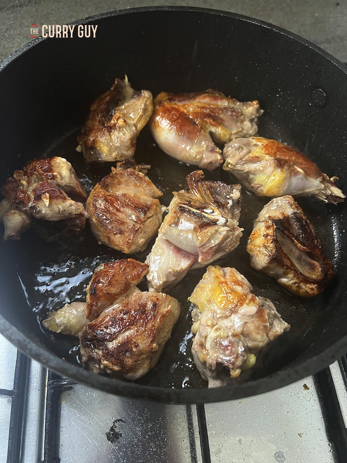 Frying the pheasant pieces to brown them.