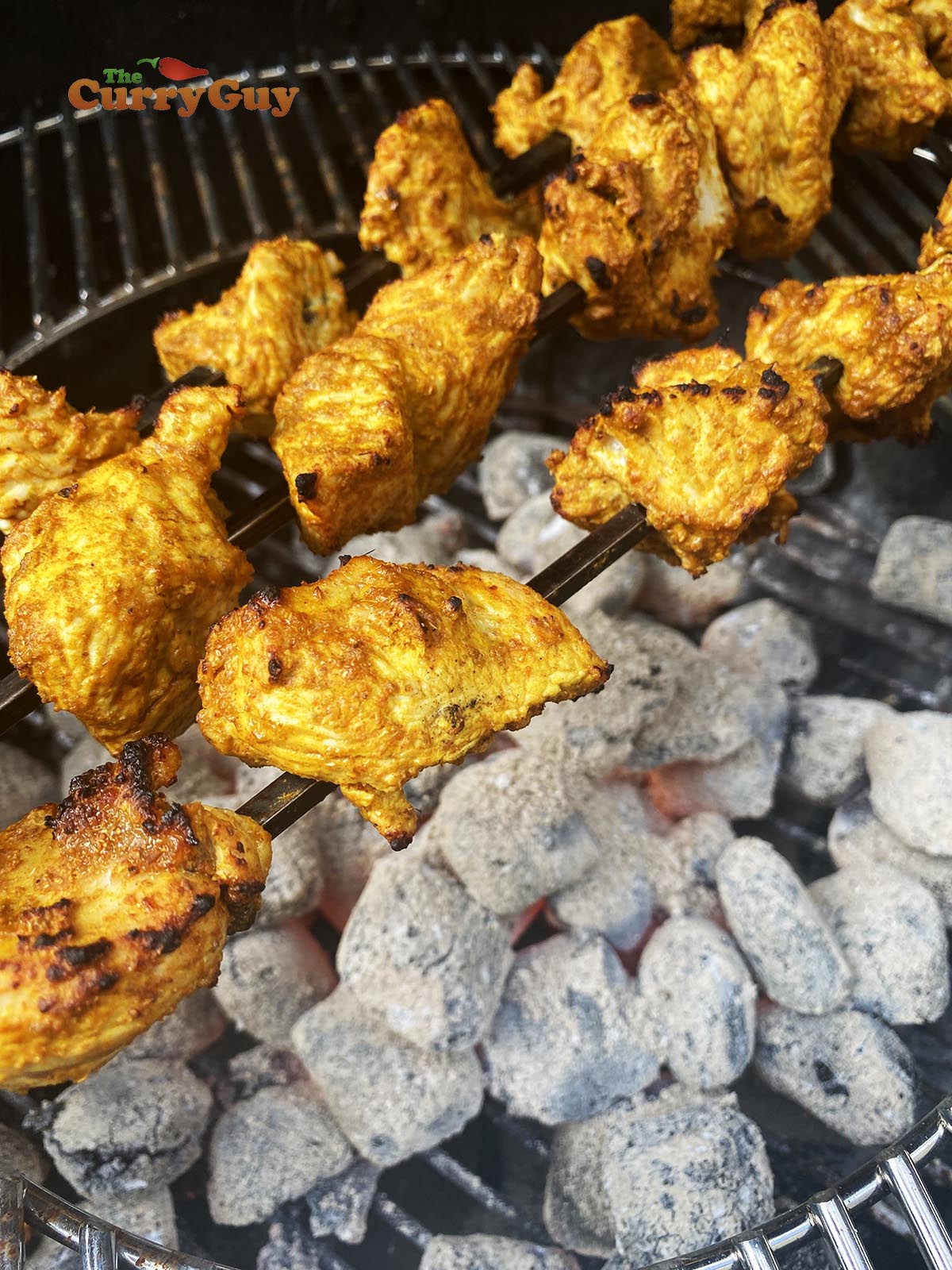 Grilling turkey tikka