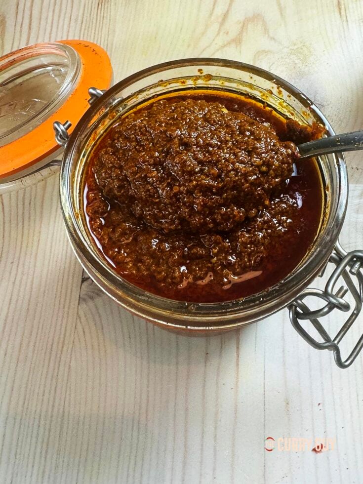 Kashmiri curry paste in a preserve jar.