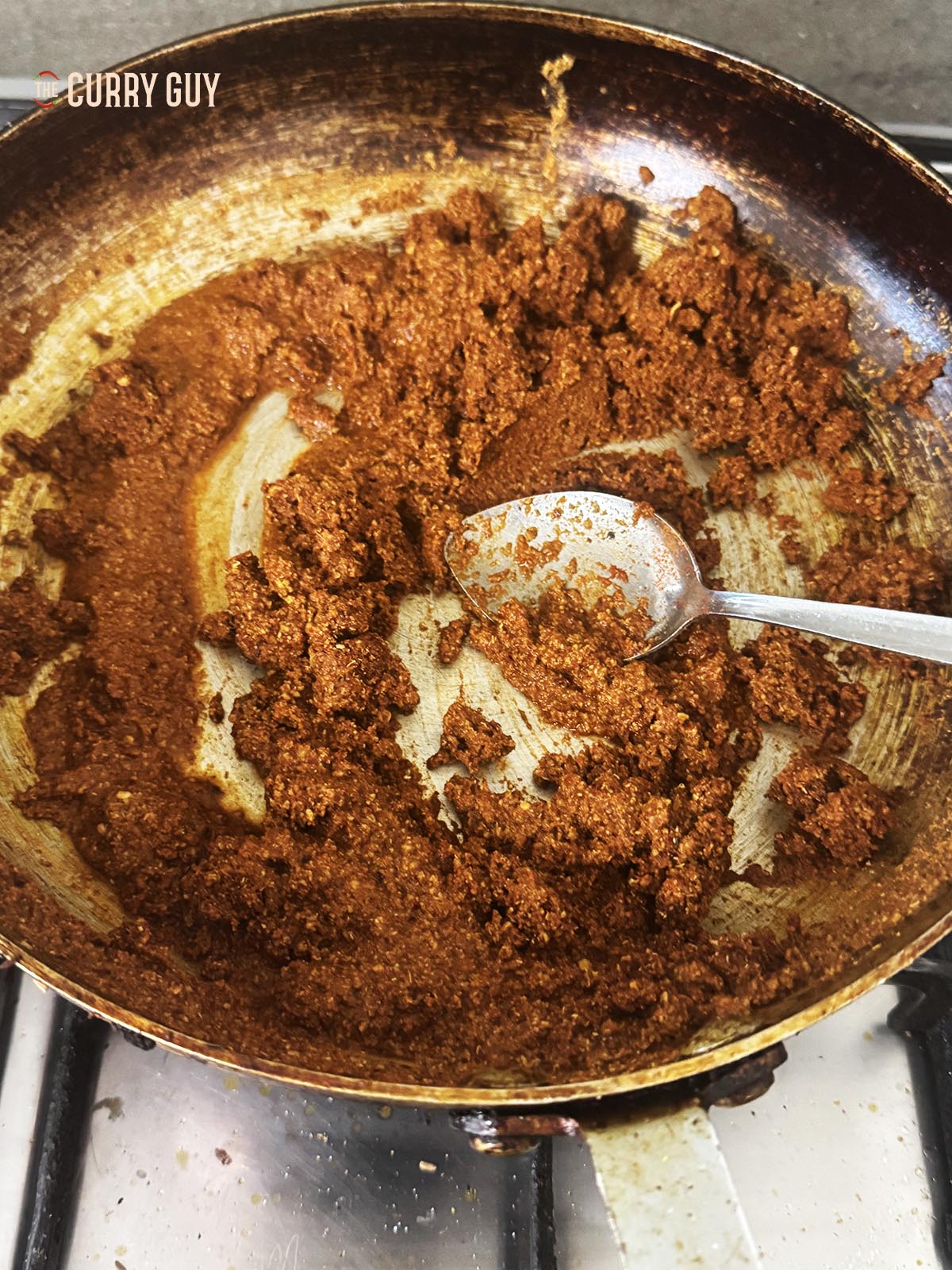 The spice paste in a pan.