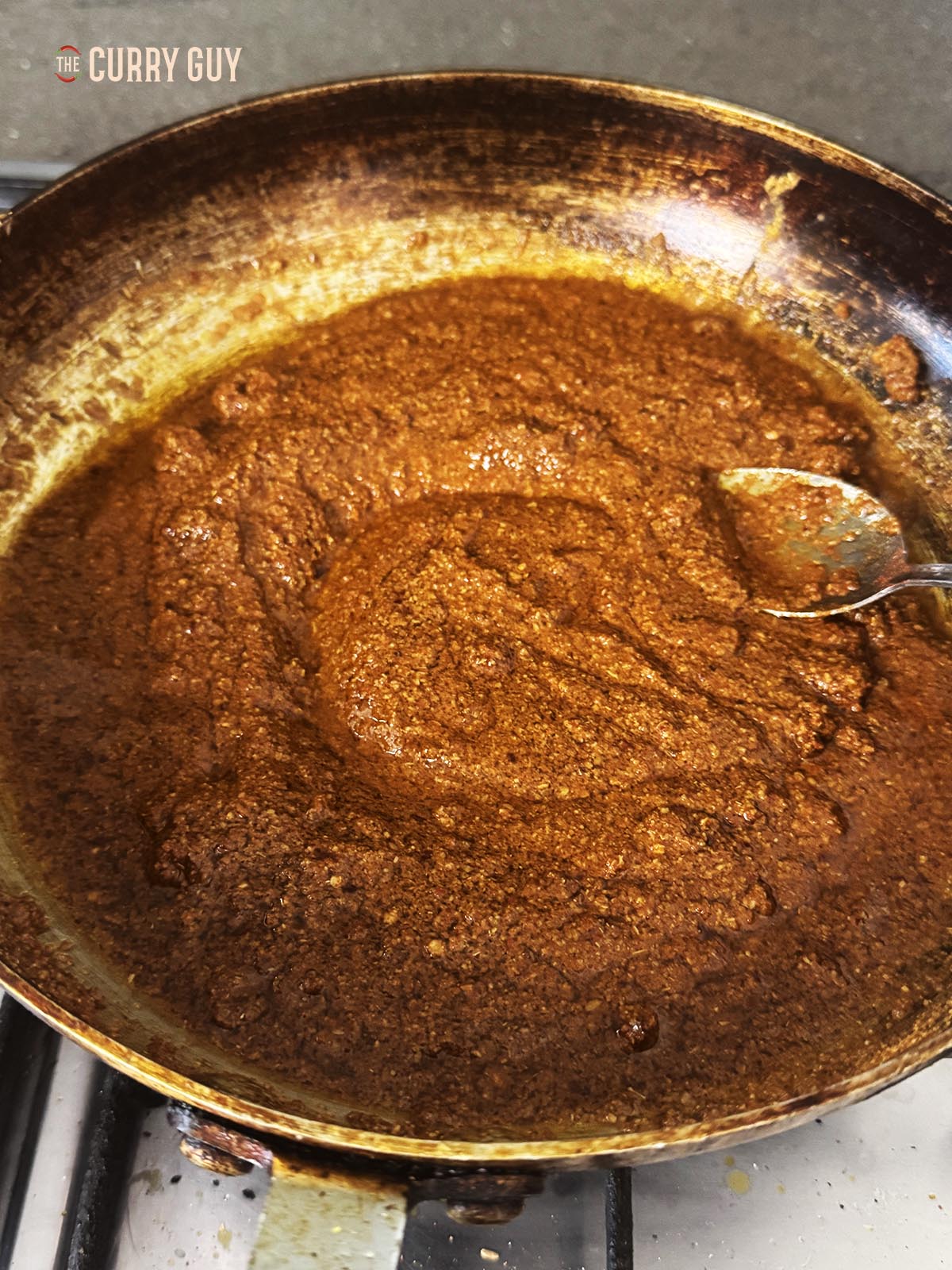 The spice paste after stirring in the oil. 