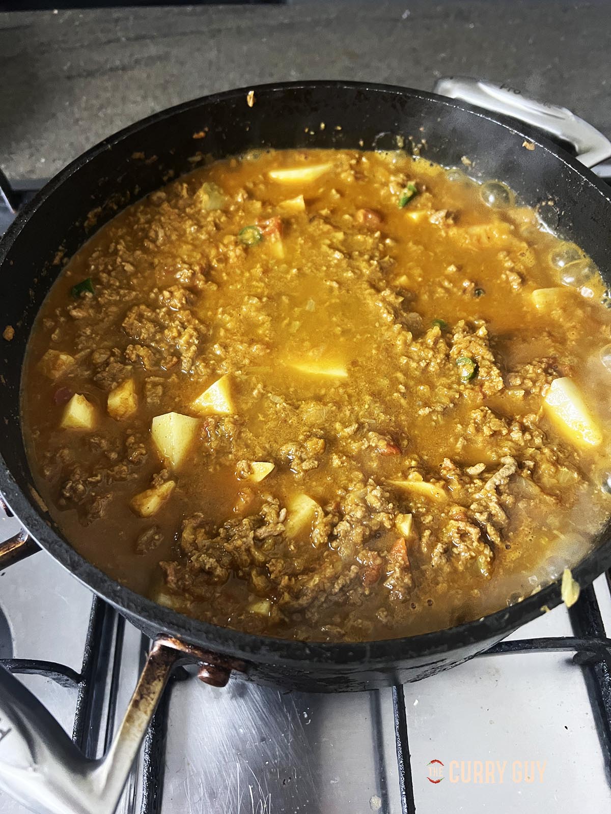 Cooking the potatoes.