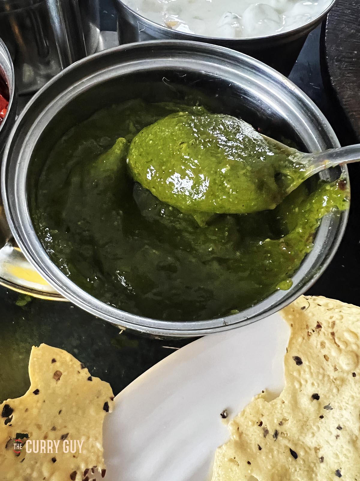 A spoonful of mint and coriander chutney.