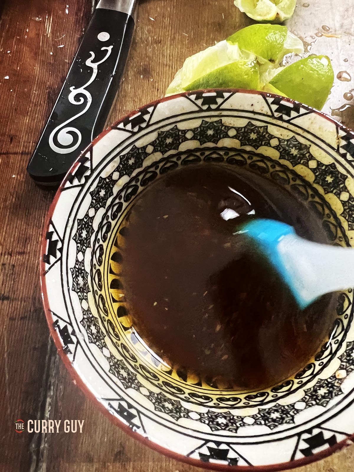 Preparing the butter and spices for basting the fish.