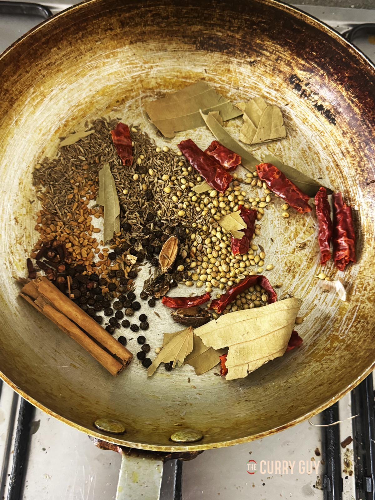 Roasting the spices in a dry frying pan for added flavour.