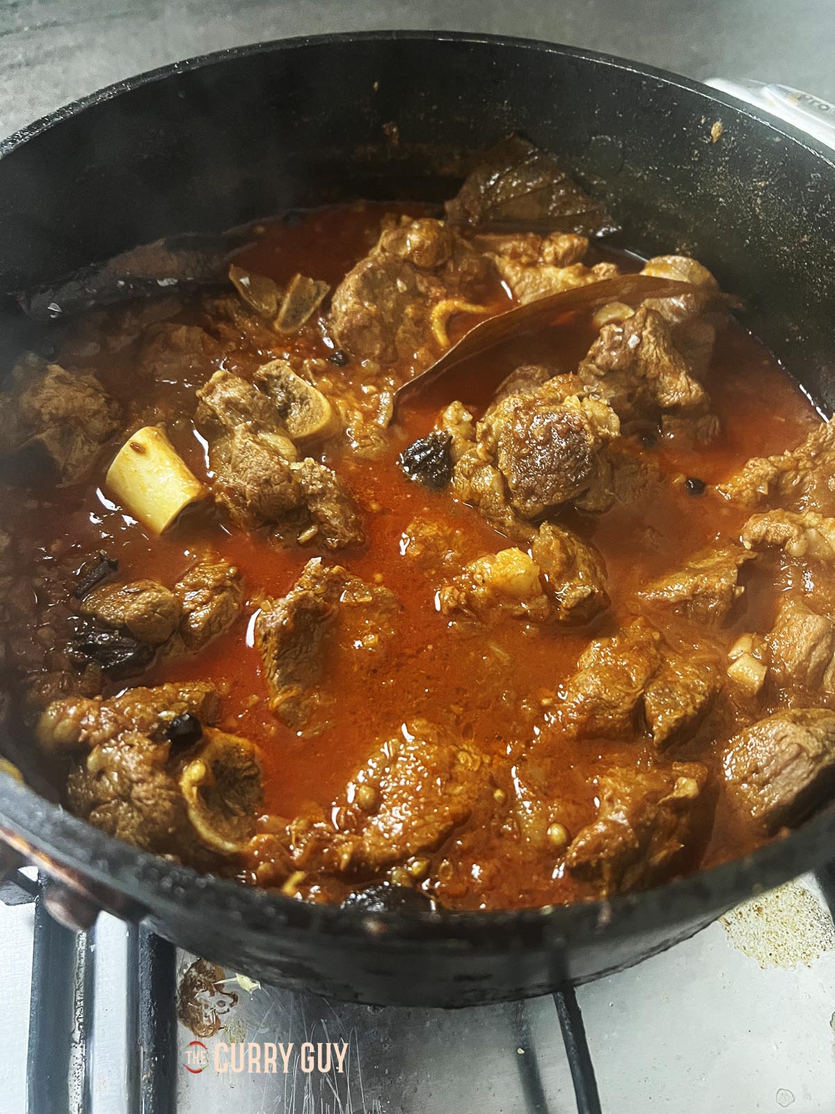 Checking the meat for tenderness.