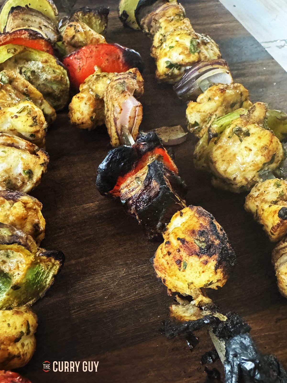The grilled monkfish on a cutting board. 