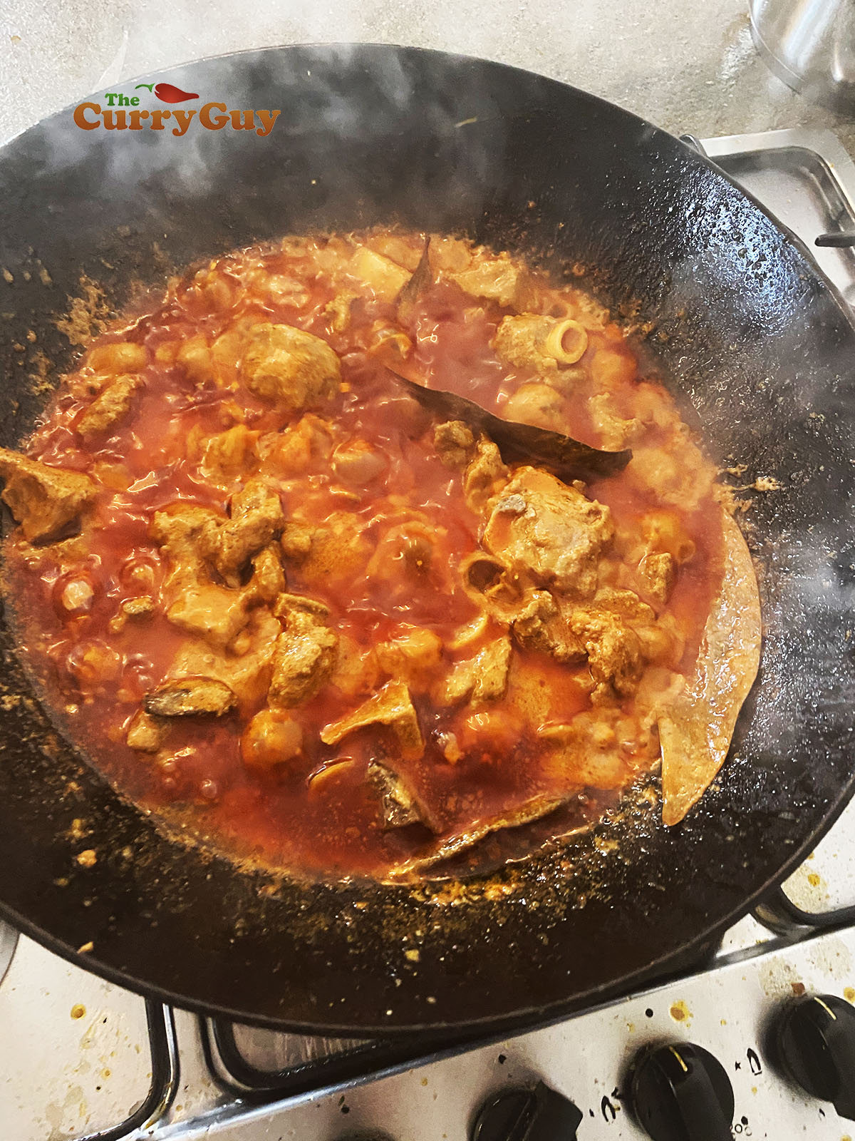 Adding more water to karahi