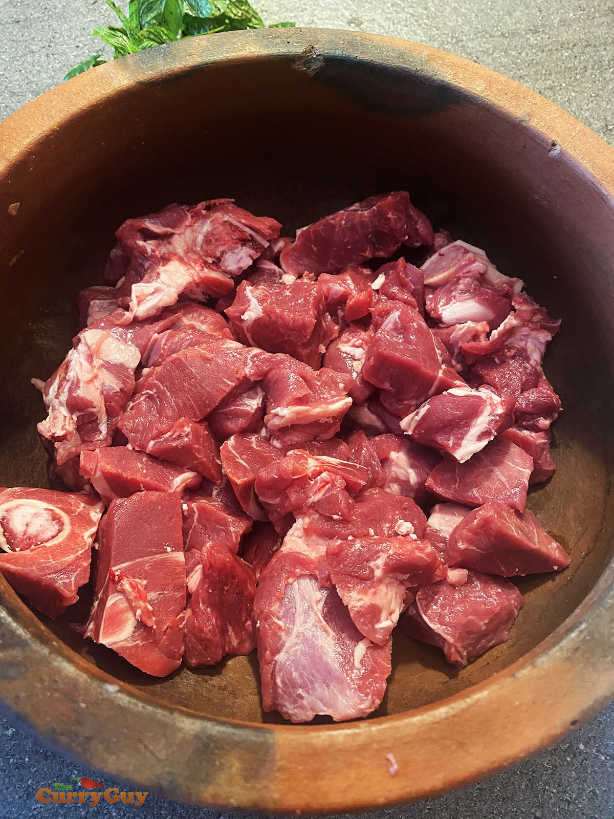 Lamb meat in a pot.