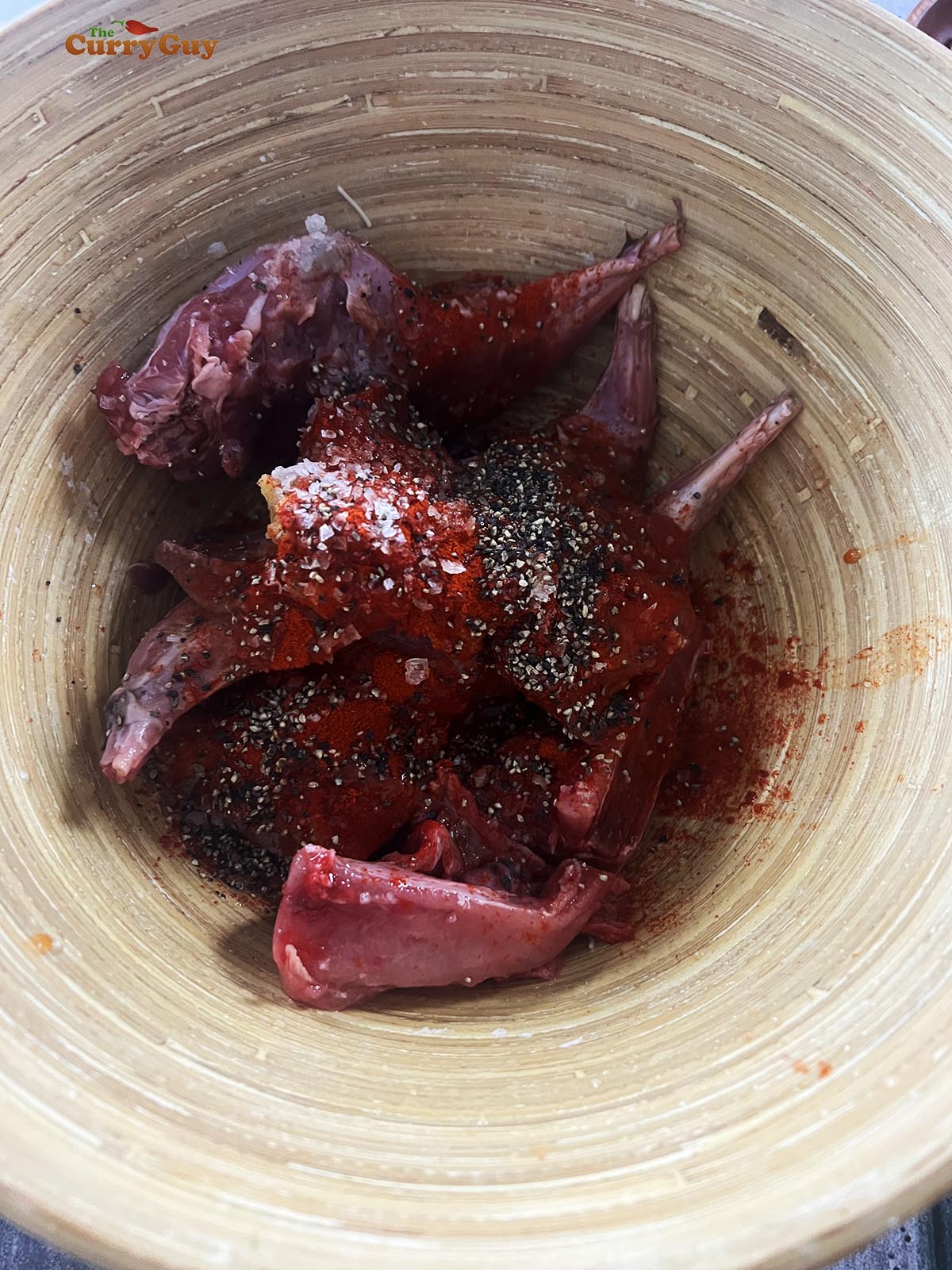 Marinating the rabbit meat