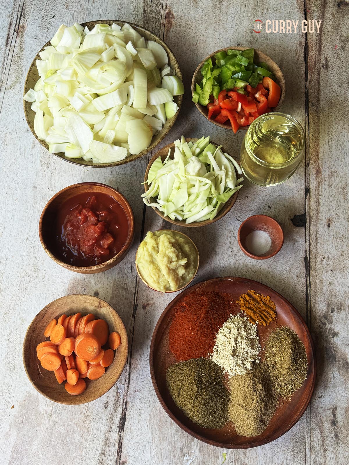 The ingredients for the recipe, prepared and laid out on a table.