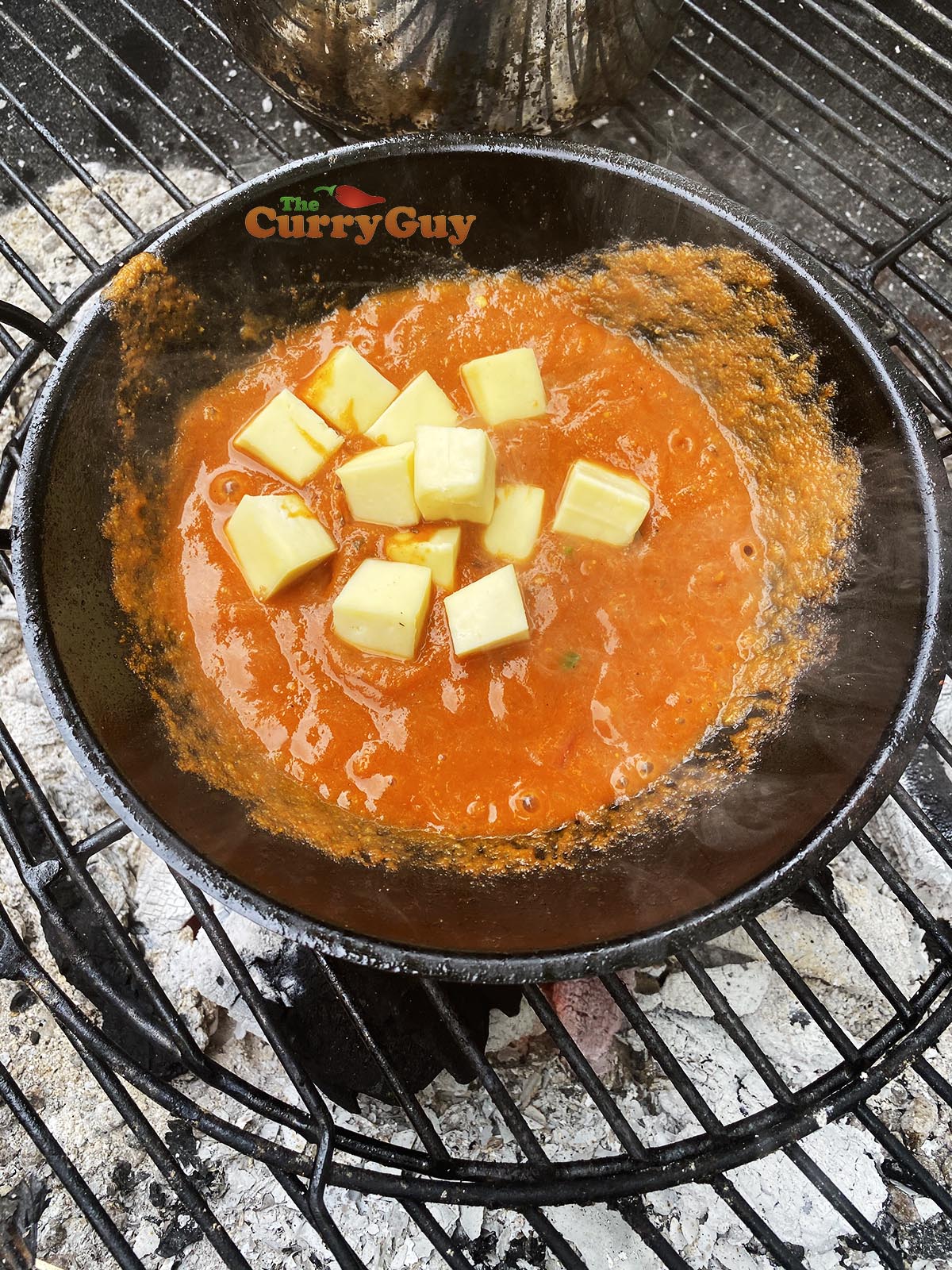 Adding paneer to balti bowl