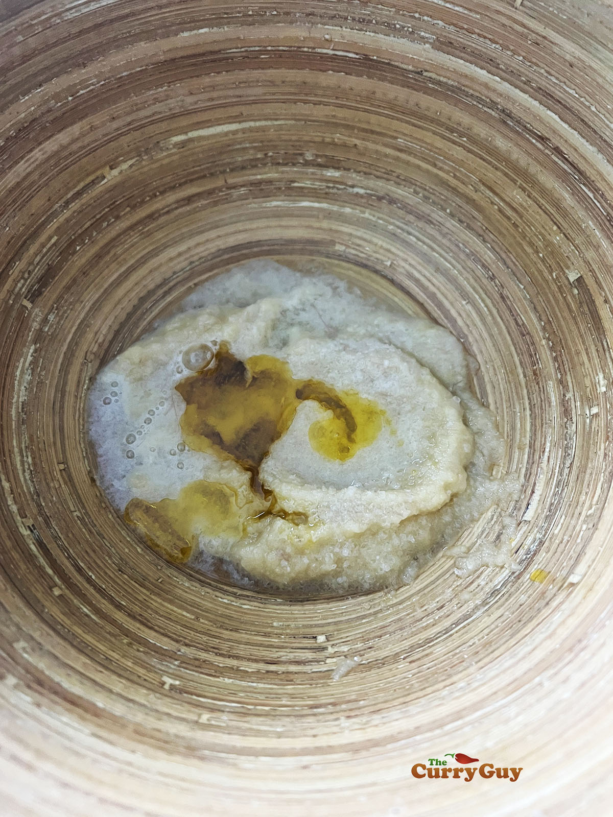 Whisking the first marinade ingredients.