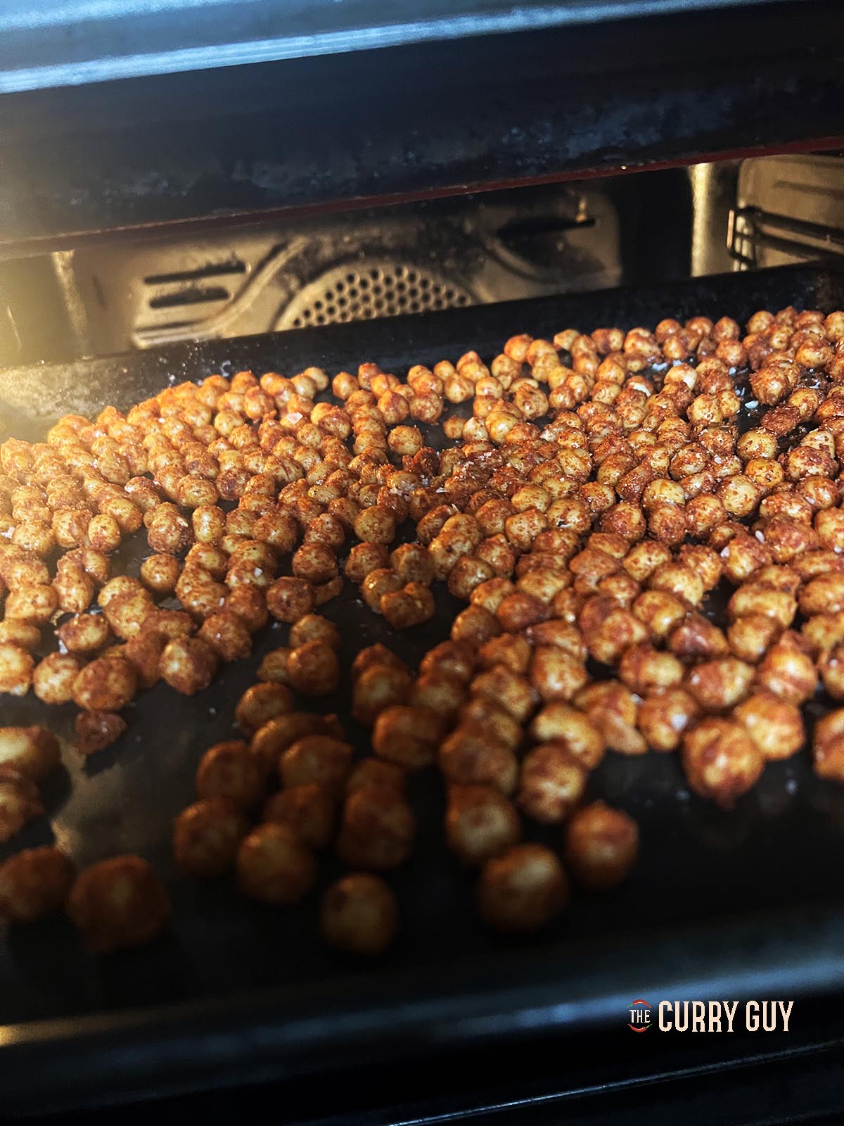 Roasting the chickpeas in the oven.