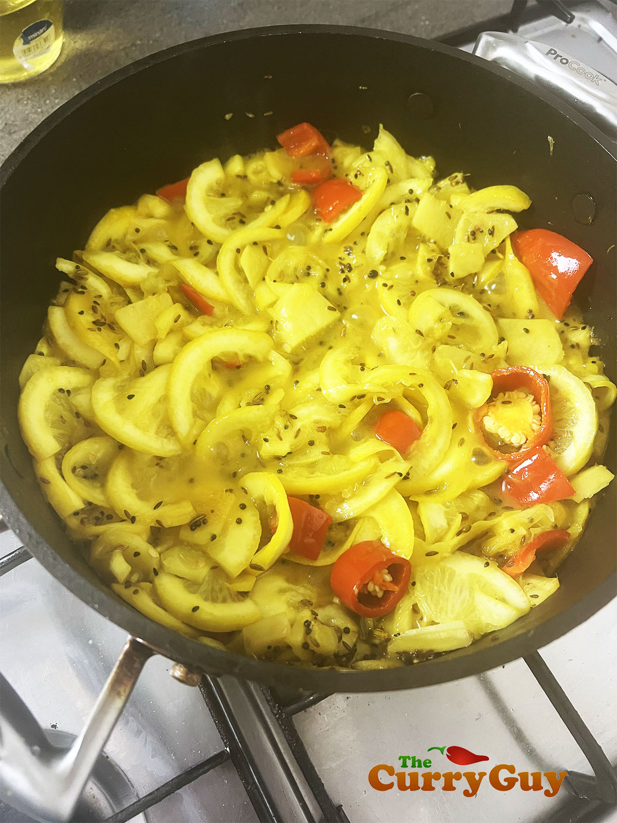 Adding the ginger and chillies.