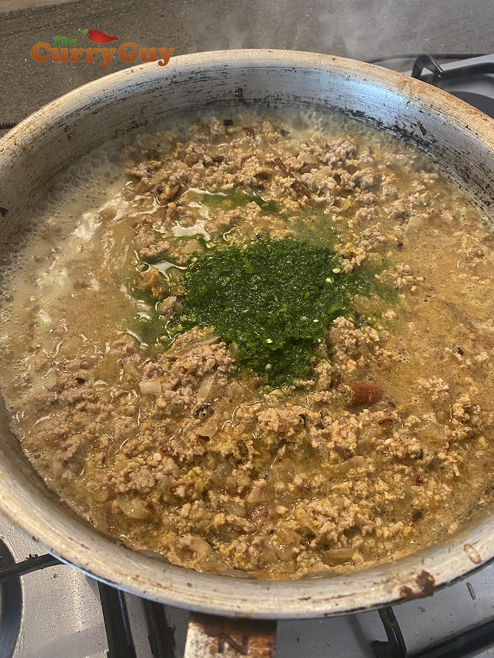 adding the coriander and chillies