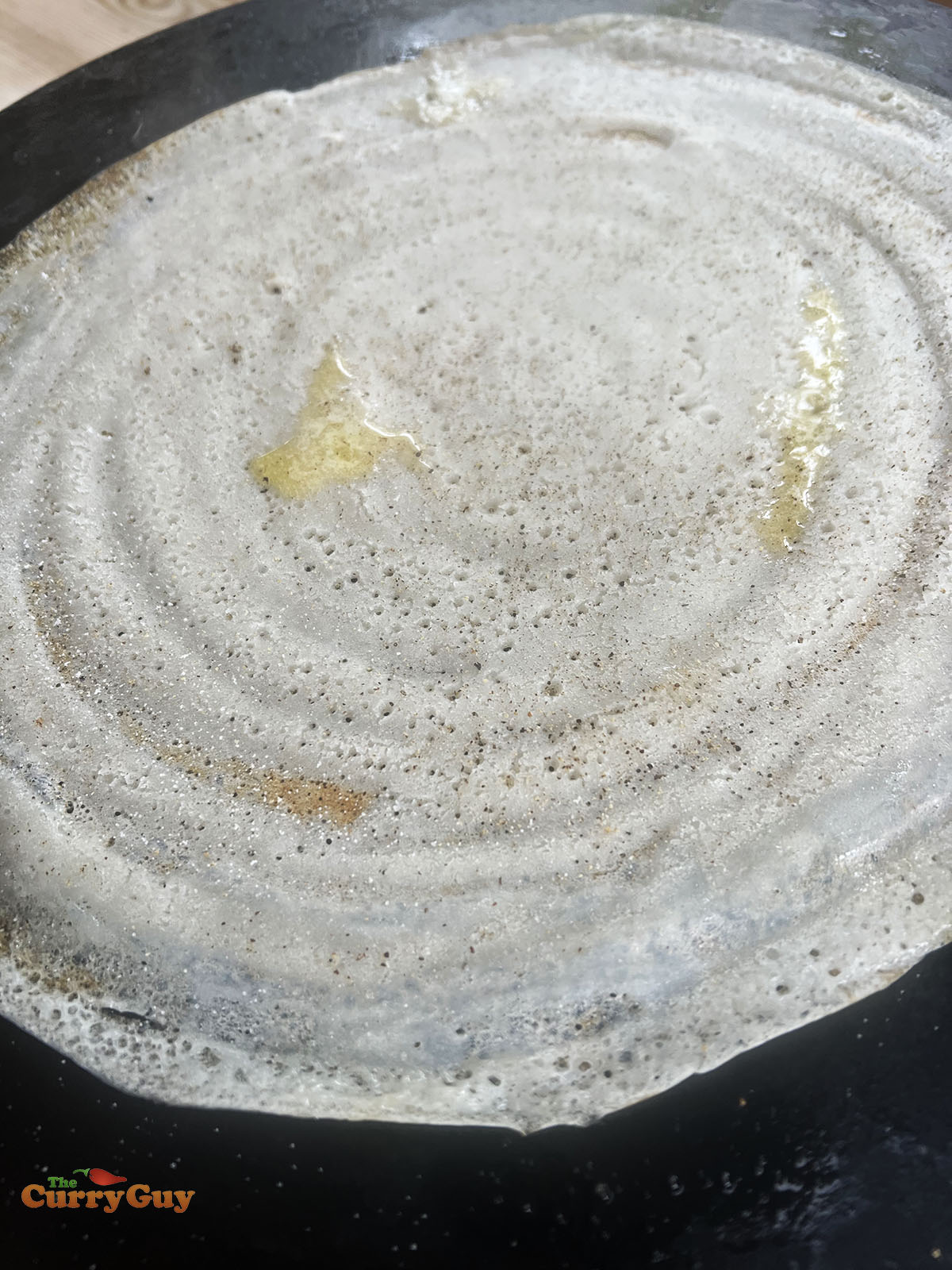 Spreading dosa batter