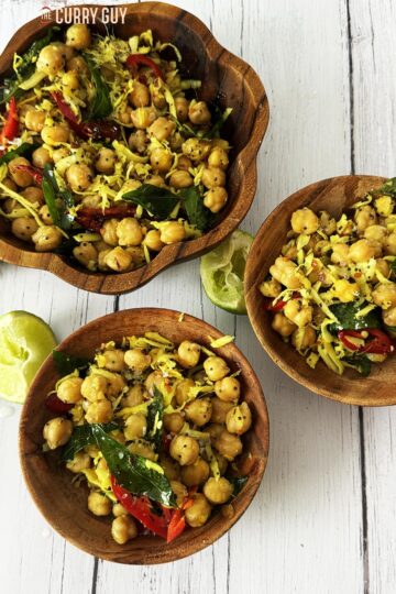 Homemade sundal in wooden serving bowls.