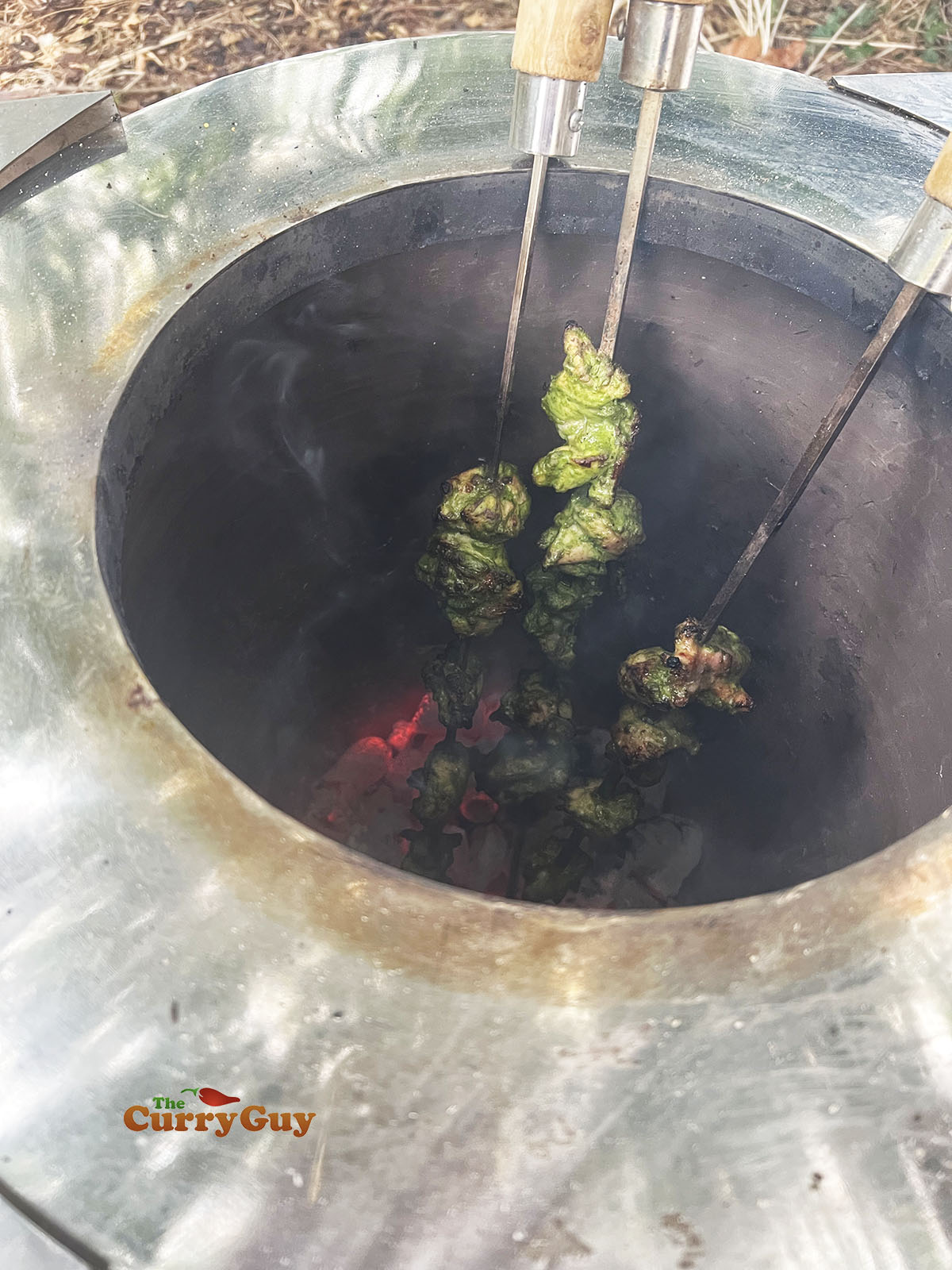 Soola chicken tikka cooking in the tandoor oven