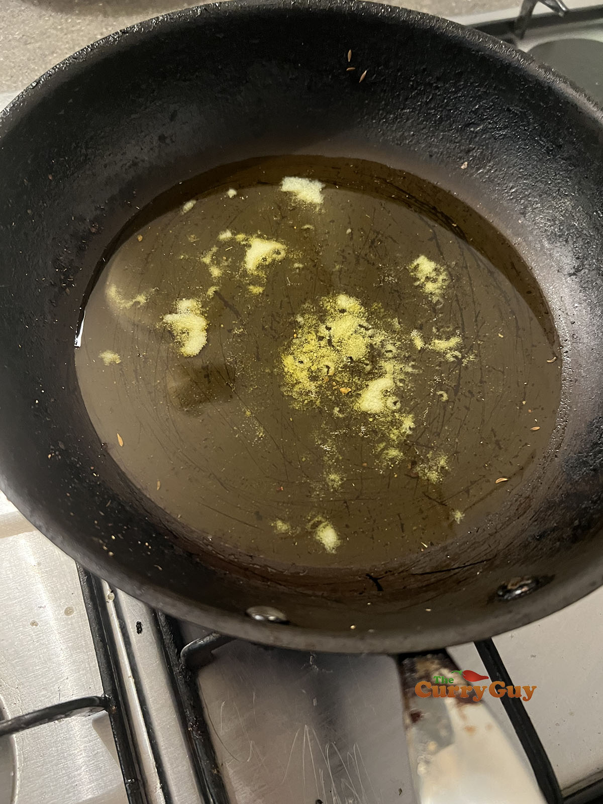 Ghee and oil in a pan