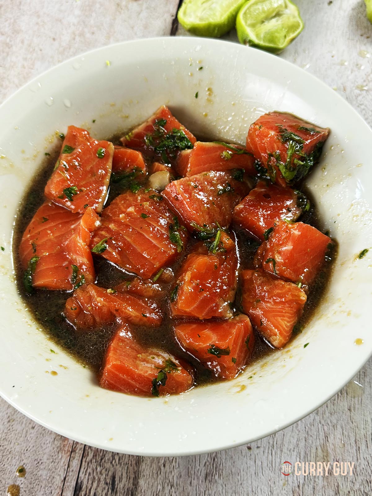 The salmon in the marinade.