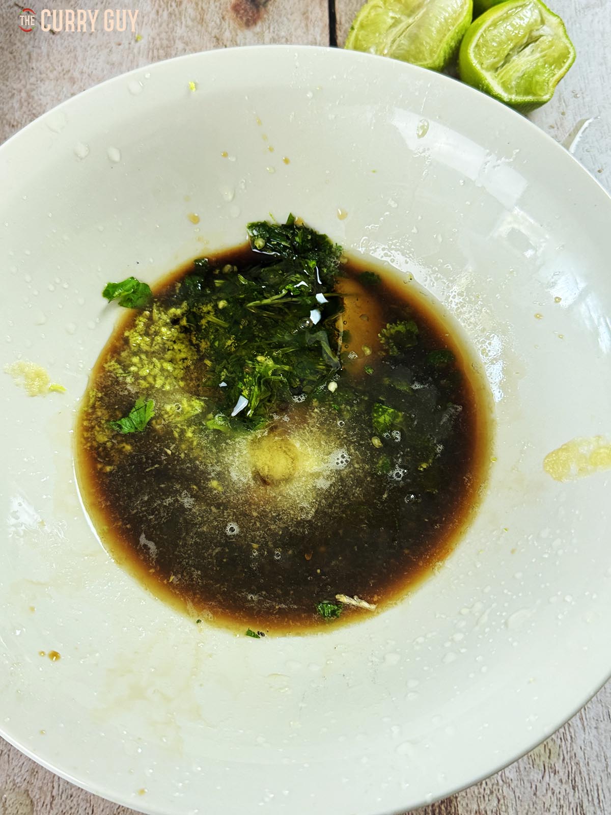 The marinade ingredients in a bowl ready to whisk and marinate the salmon.