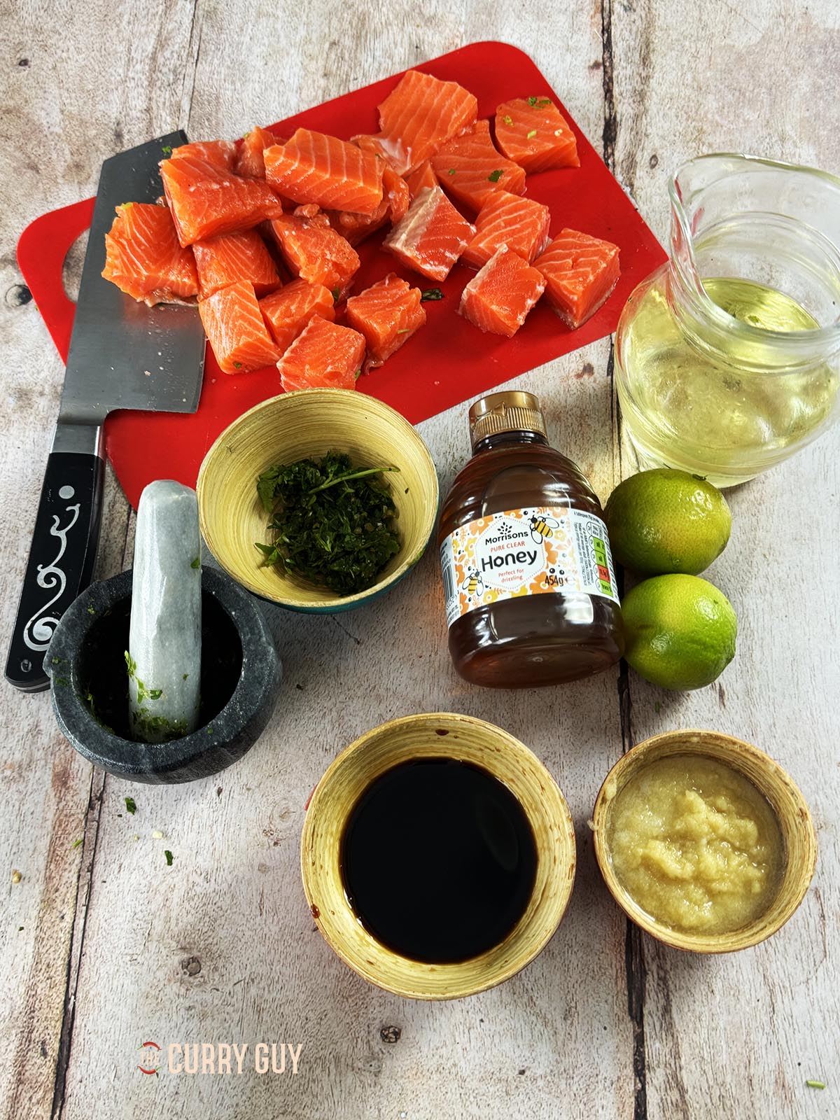 The ingredients for the recipe laid out on a countertop ready to start cooking.