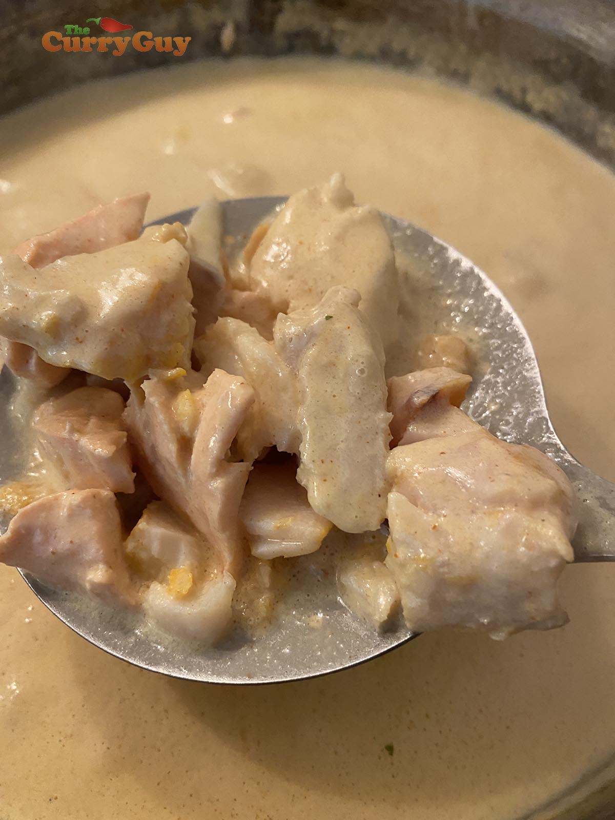 Removing cooked fish from the pan